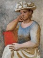 白い帽子にもたれる女性 1921 年キュビスト パブロ・ピカソ